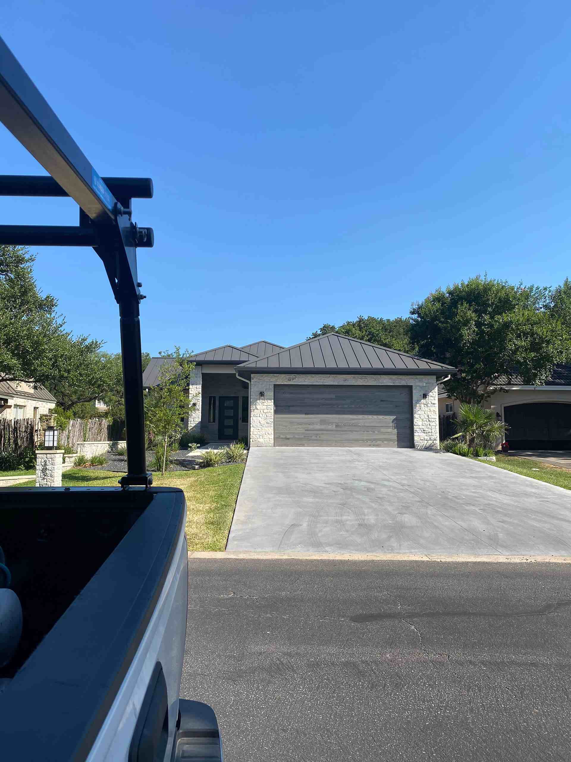 Garage door replacement completed by Door Pro Plus for a Texas Hill Country homeowner