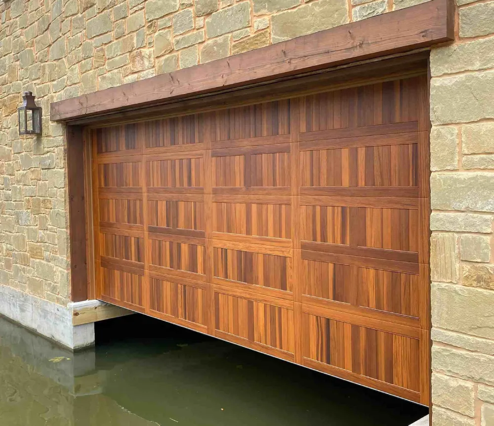 Garage door with newly serviced springs and hardware after repair by Door Pro Plus in Marble Falls, TX